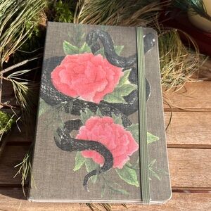 Moleskine legendary notebook with snake and roses